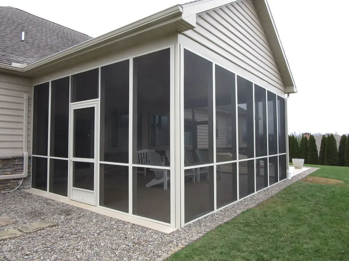 Professional screen room and deck installation in Wilmington, NC with pergola structure
